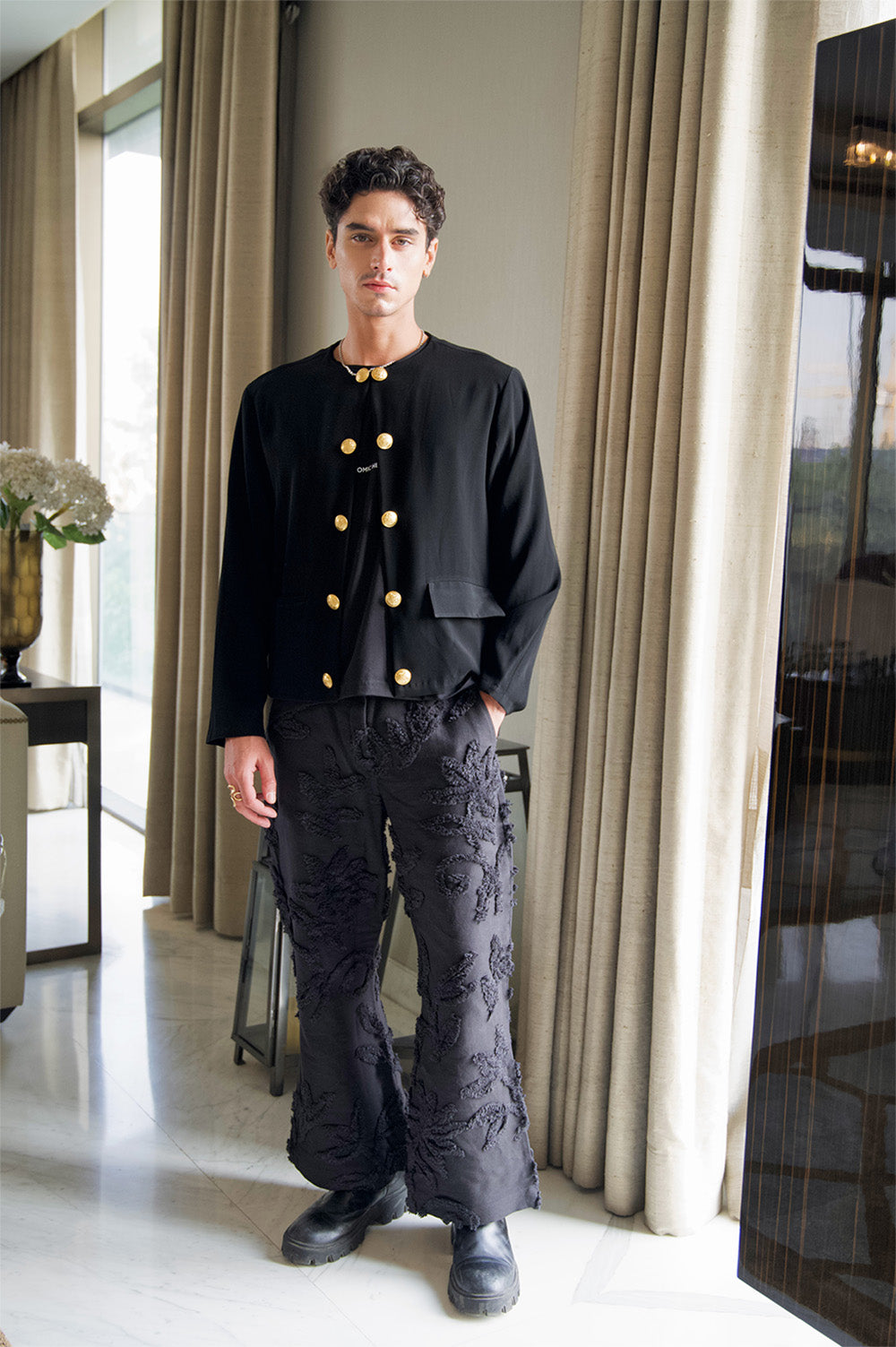 Floral flourish flared trousers